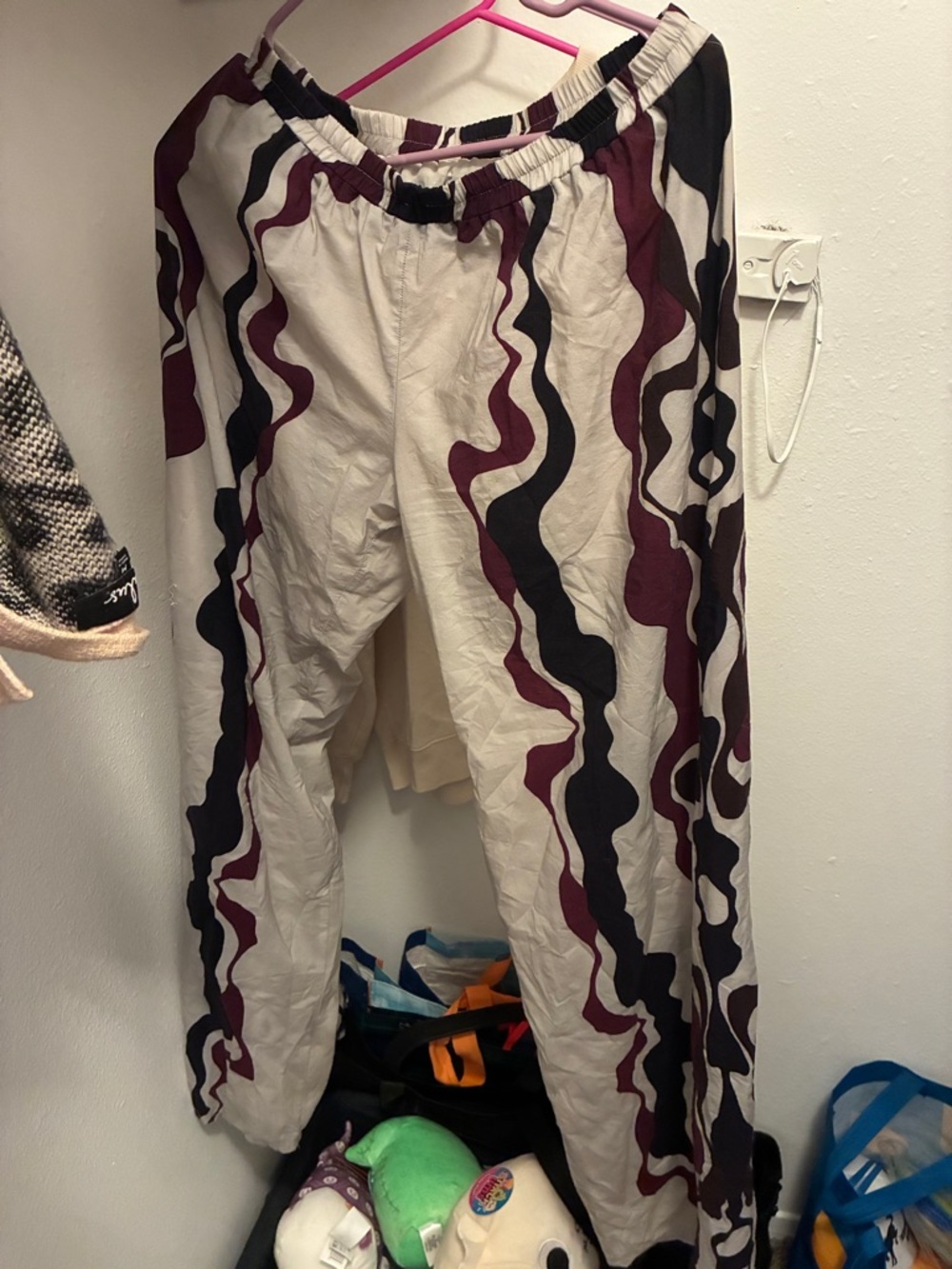Cream Anthropologie Pants with Purple and Fuschia Wavy Print